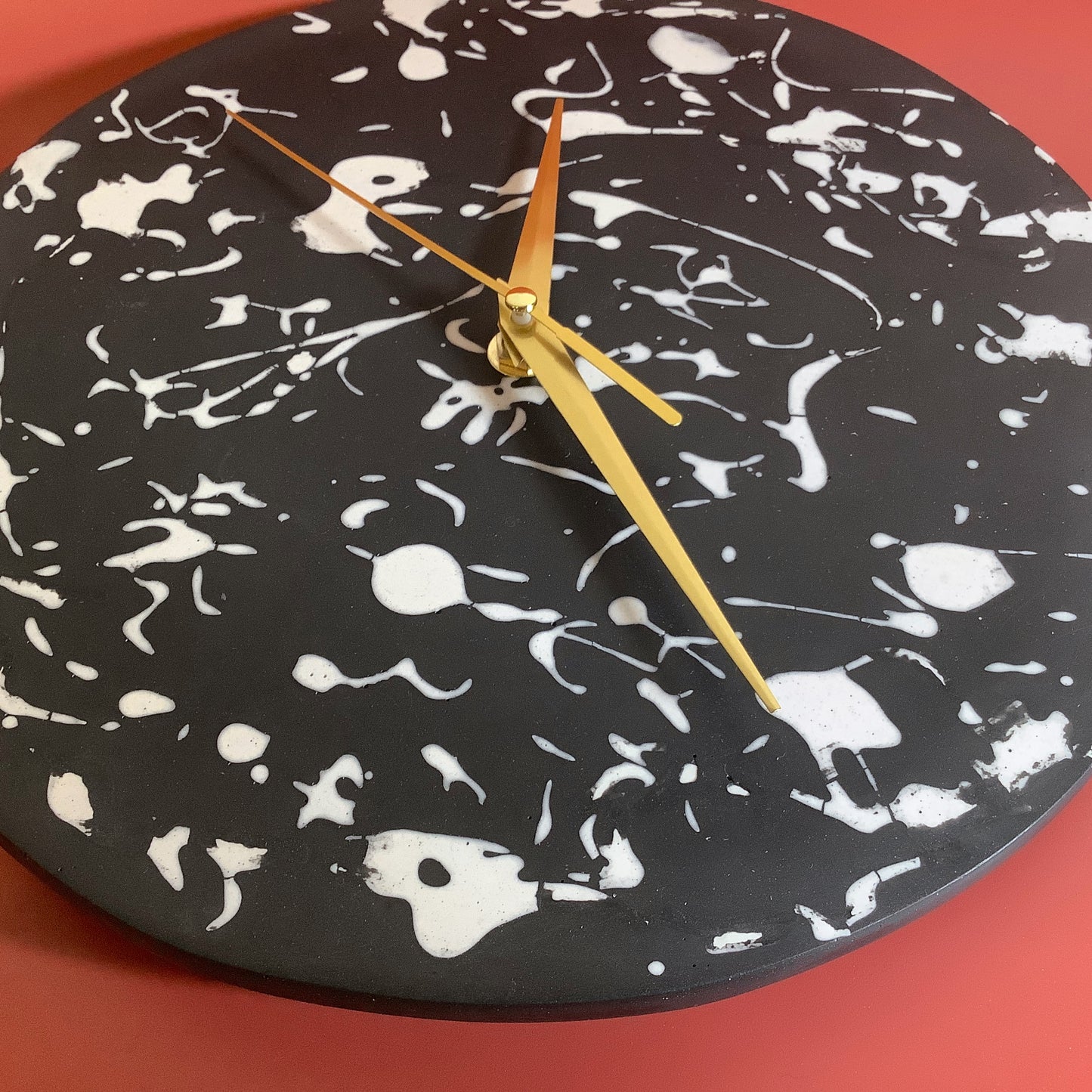 Black and White Splatter Hanging Clock