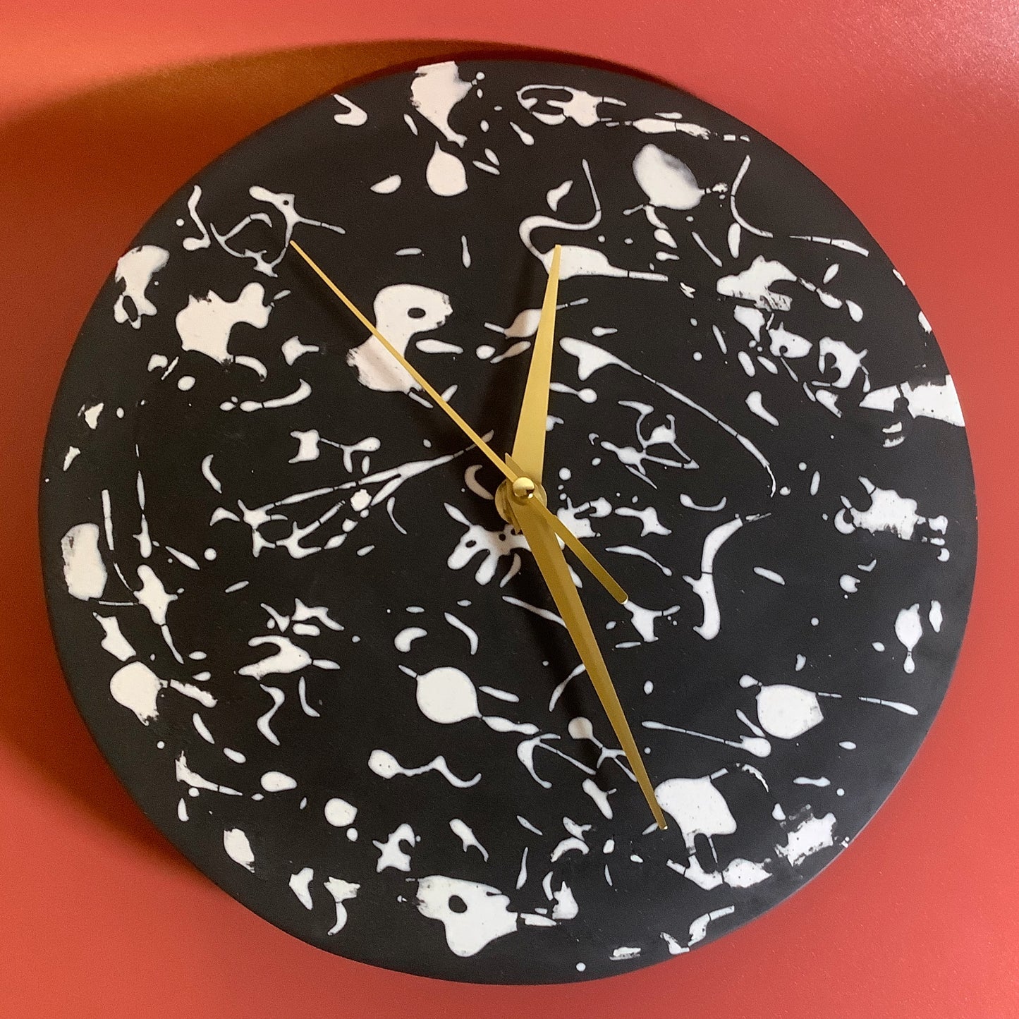Black and White Splatter Hanging Clock