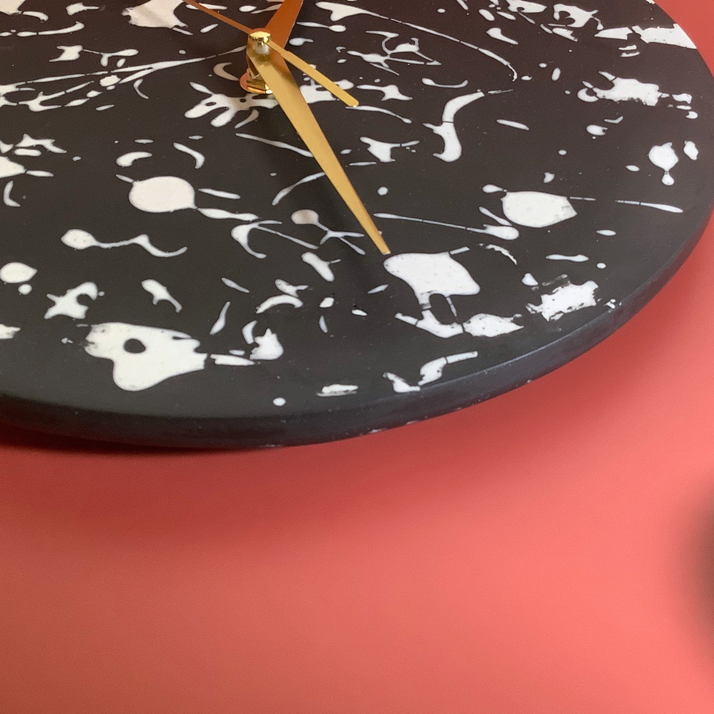 Black and White Splatter Hanging Clock